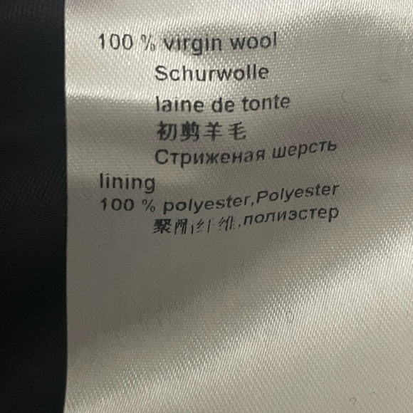 Marc Cain knit black knee length skirt with metallic silver side seams. - Picture 9 of 14